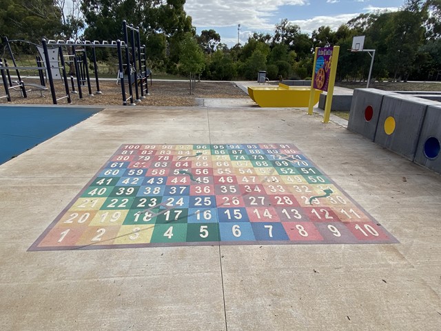 Playgrounds with Snakes and Ladders Games